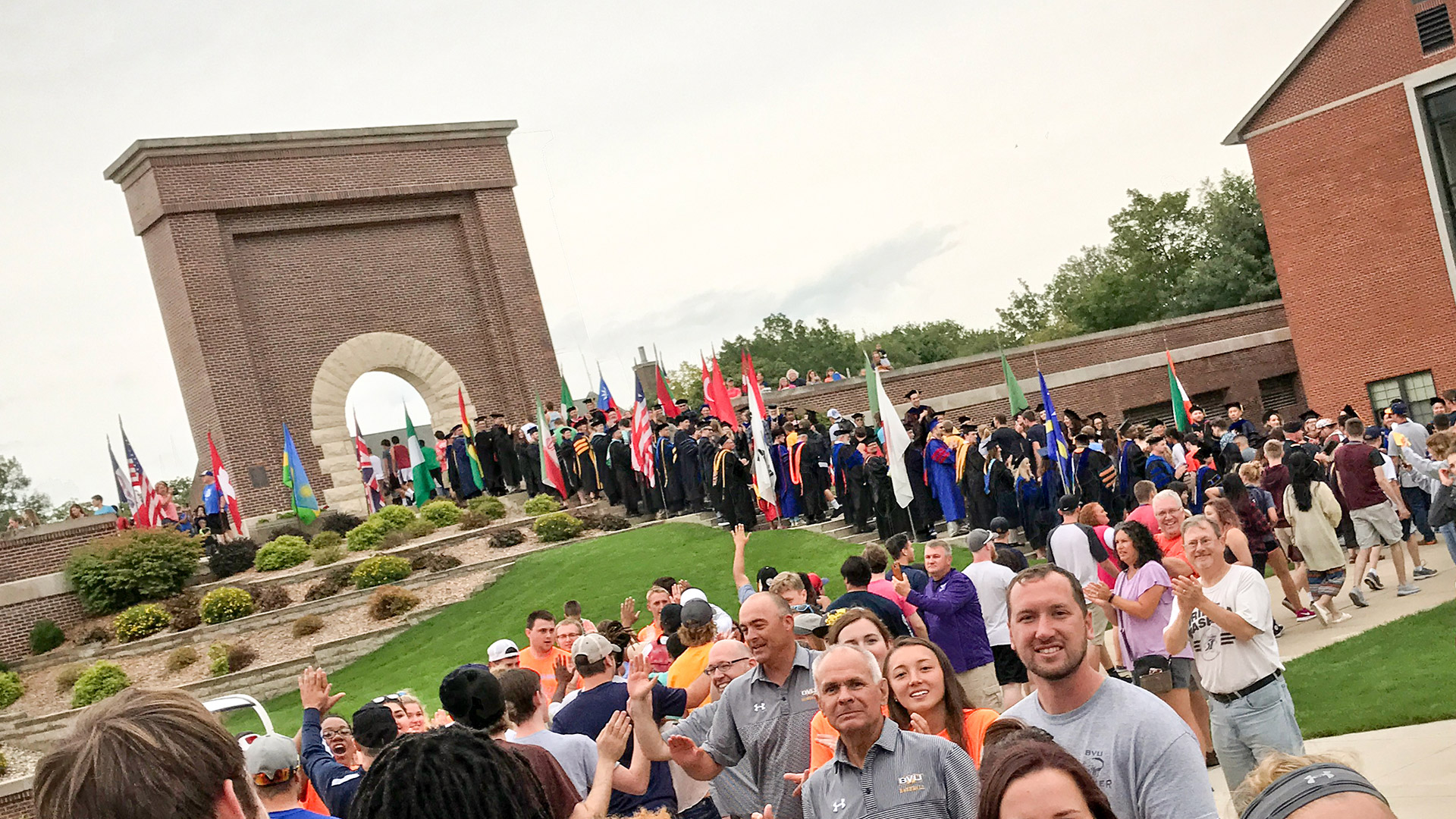Students walk through Victory Arch