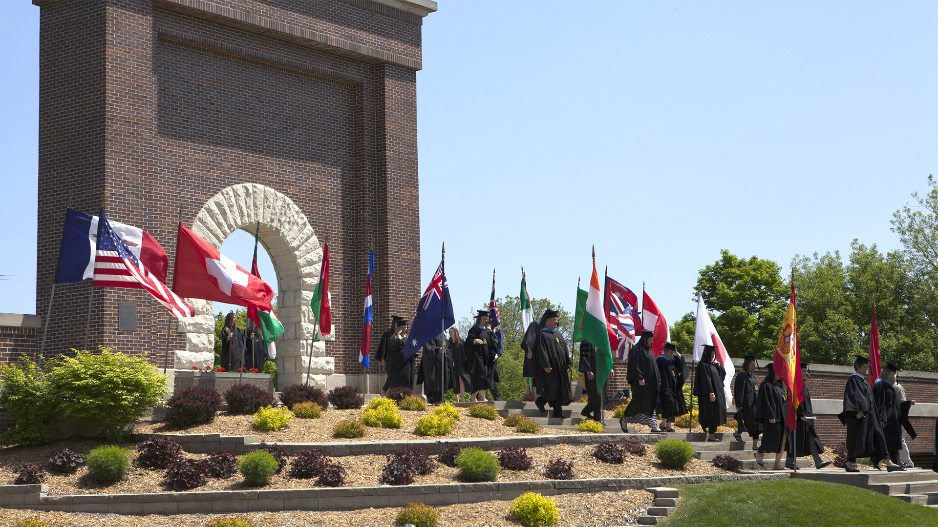 Commencment procession through Victory Arch
